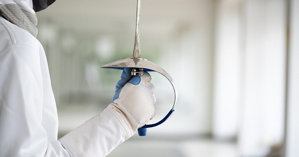 US -Zäune trifft Sportlerinnen aus, weil sie sich geweigert haben, den Mann zu verweigern